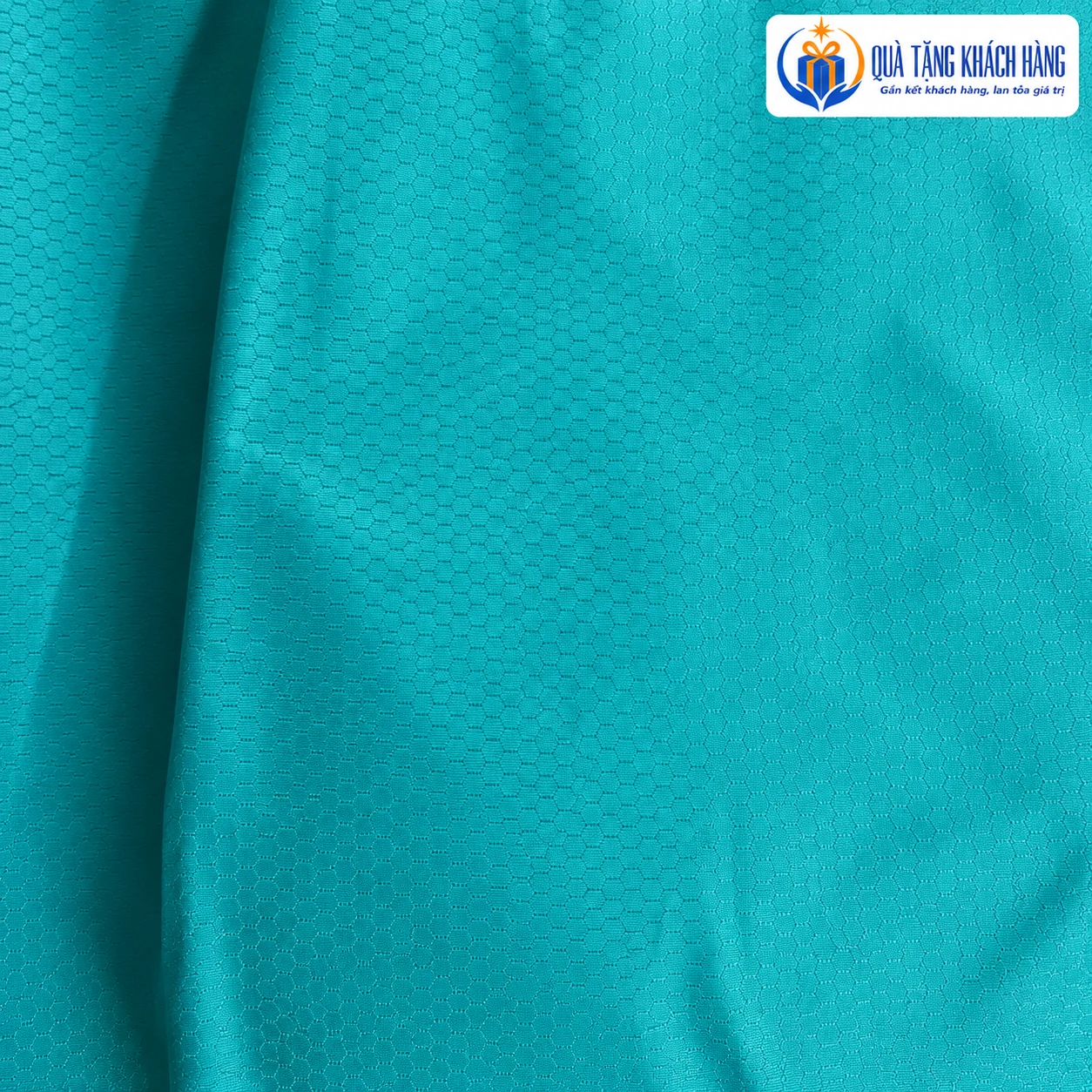 Cận vân vải dù tổ ong màu xanh ngọc dùng đối chiếu Poncho