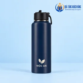 Bình Rạng Đông xanh than bản trơn có logo lá và tên MỘC AN nhỏ ở phần thân dưới.