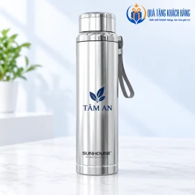 Bình Sunhouse Flexi inox có biểu tượng lá và tên TÂM AN xanh ở giữa thân.