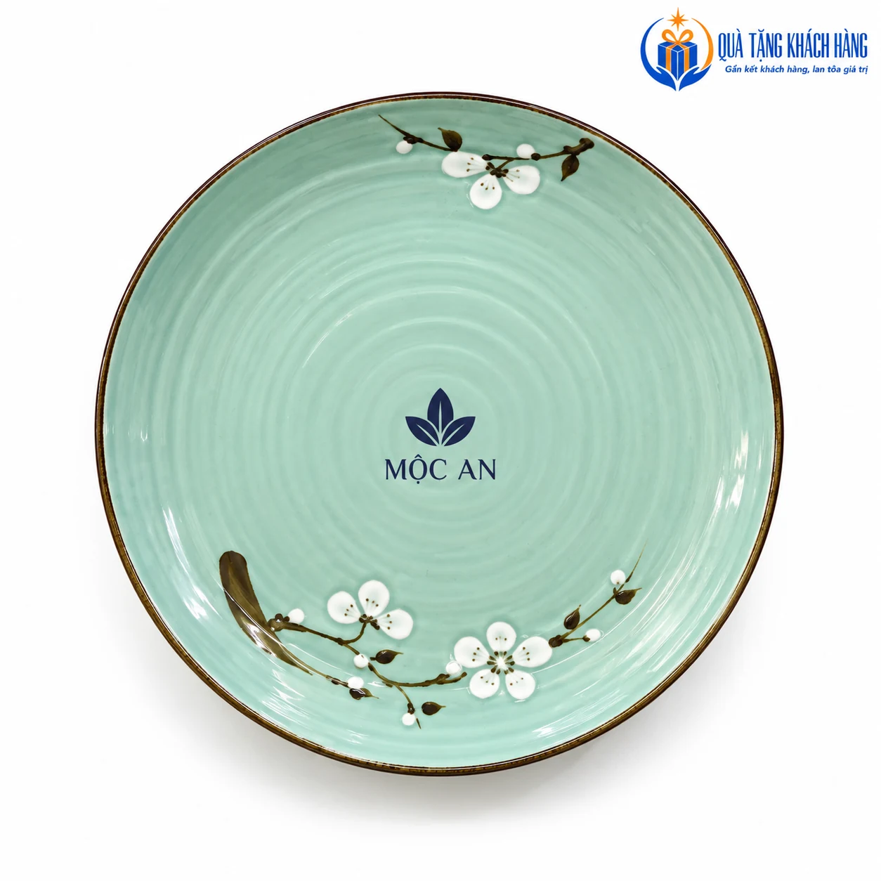 Mô phỏng logo MỘC AN trên đĩa men xanh