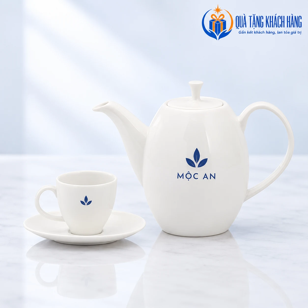 Mô phỏng logo MỘC AN trên ấm và tách Anna trắng ngà