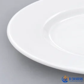 Cận vành đĩa sứ Minh Châu men trắng