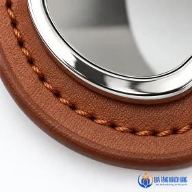 Cận mặt kim loại và viền chỉ nâu